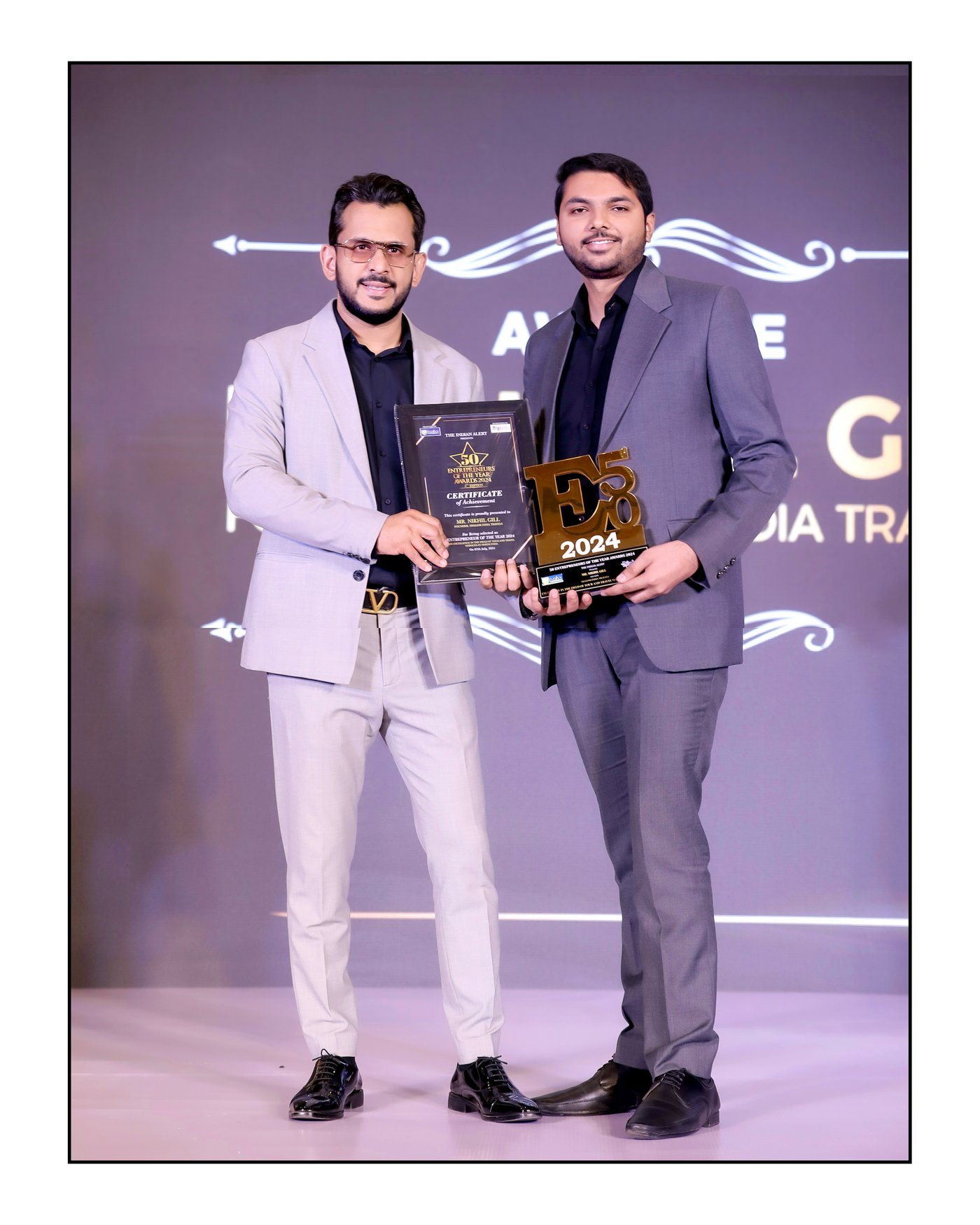 Nikhil Gill receiving the 50 Entrepreneurs of the Year Award 2024