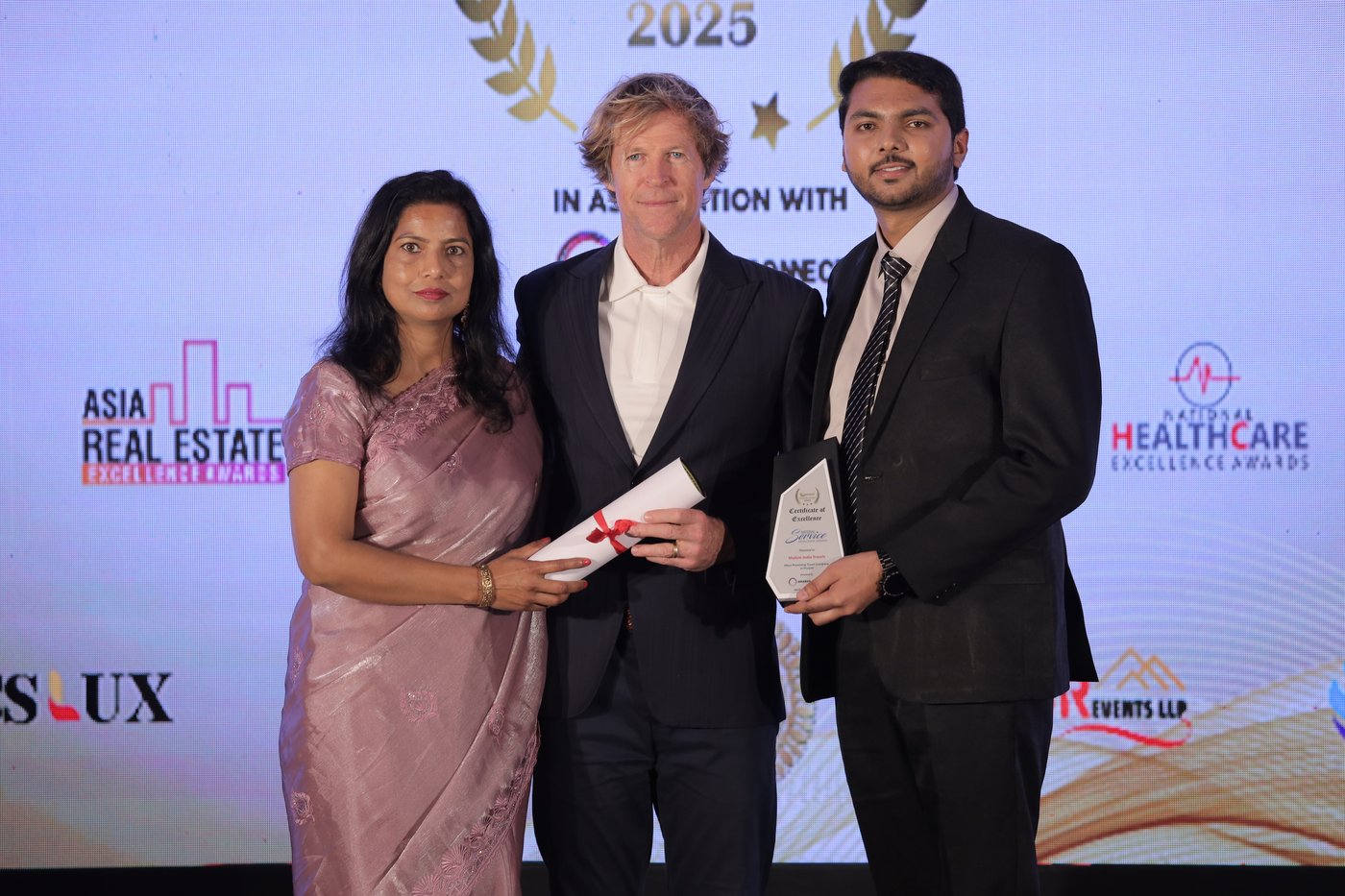 Nikhil Gill receiving the National Service Excellence Award 2025